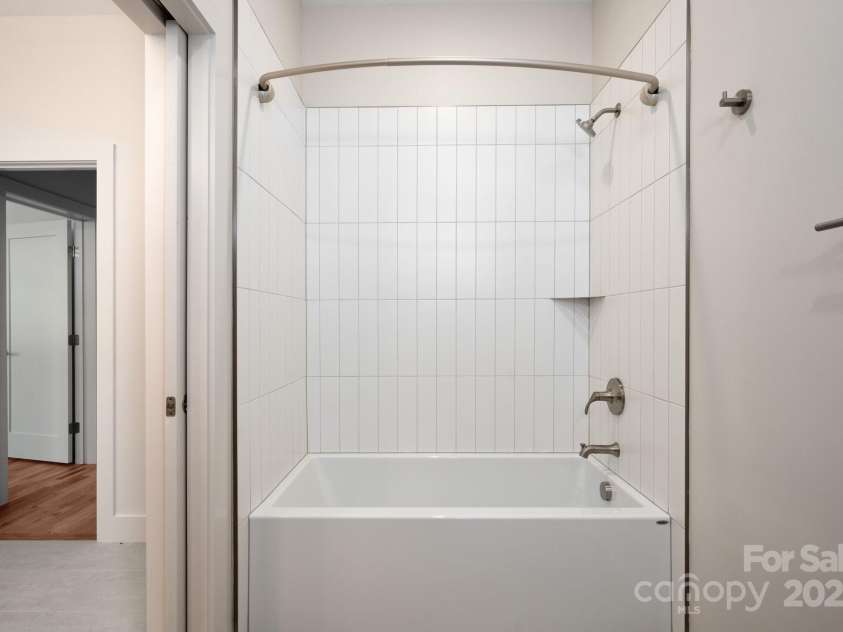 9 Orrinel Way, Asheville, NC 28806.  MLS# CAR4257922, YatesRealty ID 18885. Tiled Shower + Tub