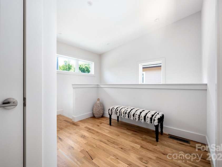 9 Orrinel Way, Asheville, NC 28806.  MLS# CAR4257922, YatesRealty ID 18885. Upstairs Landing with Sitting Nook