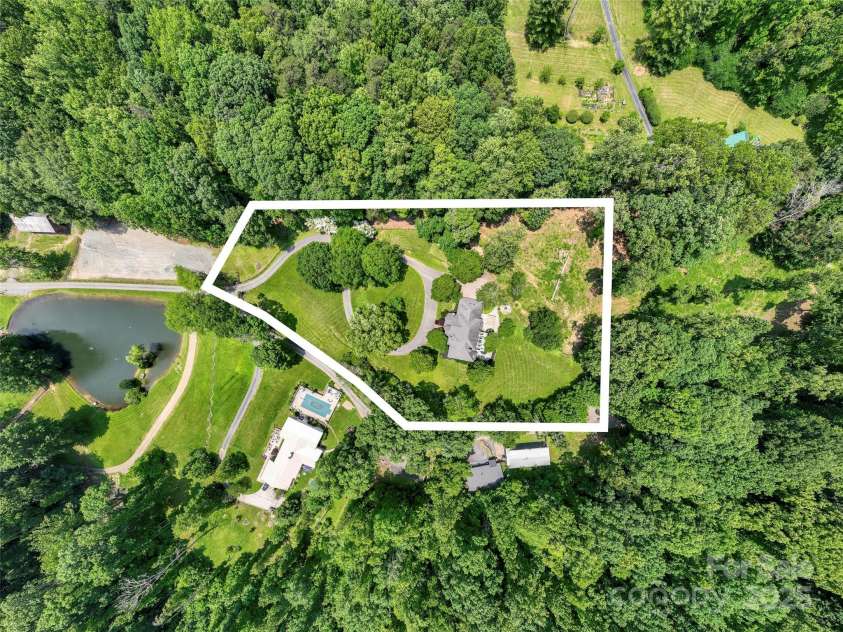 118 Holcombe Cove Road, Candler, NC 28715.  MLS# CAR4267298, YatesRealty ID 18886. 