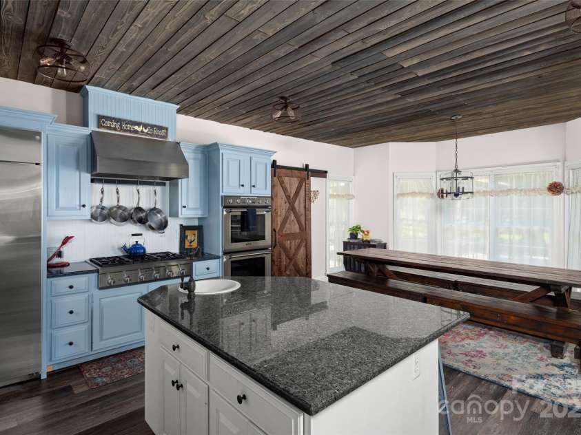 118 Holcombe Cove Road, Candler, NC 28715.  MLS# CAR4267298, YatesRealty ID 18886. 