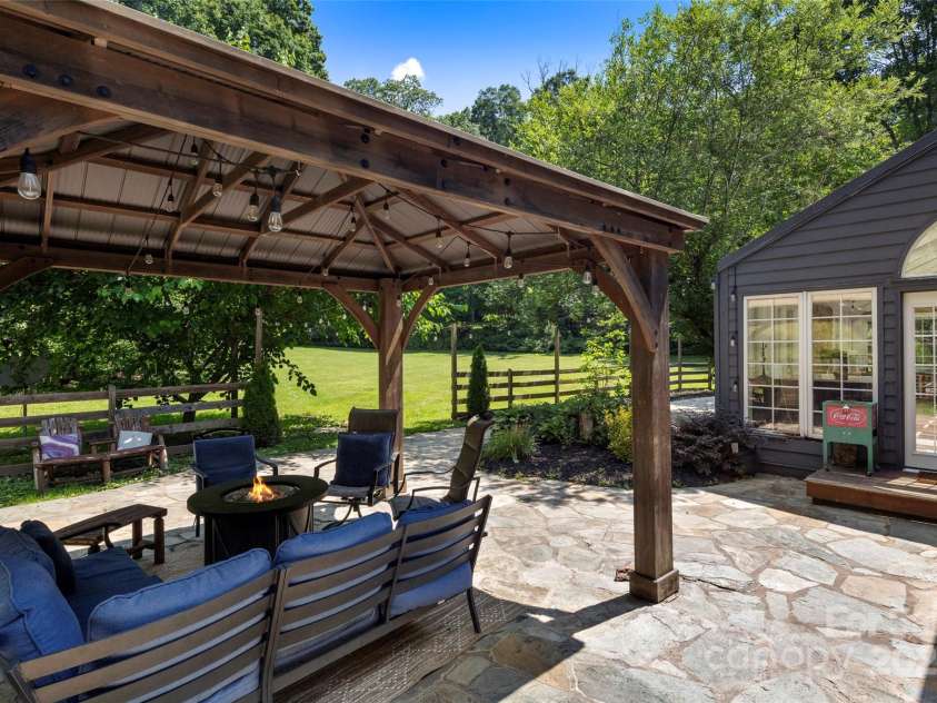 118 Holcombe Cove Road, Candler, NC 28715.  MLS# CAR4267298, YatesRealty ID 18886. 