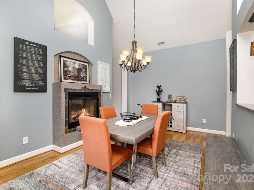 14807 Middlesborough Drive, Matthews, NC 28104.  MLS# CAR4252335, YatesRealty ID 18889. Double sided fireplace
