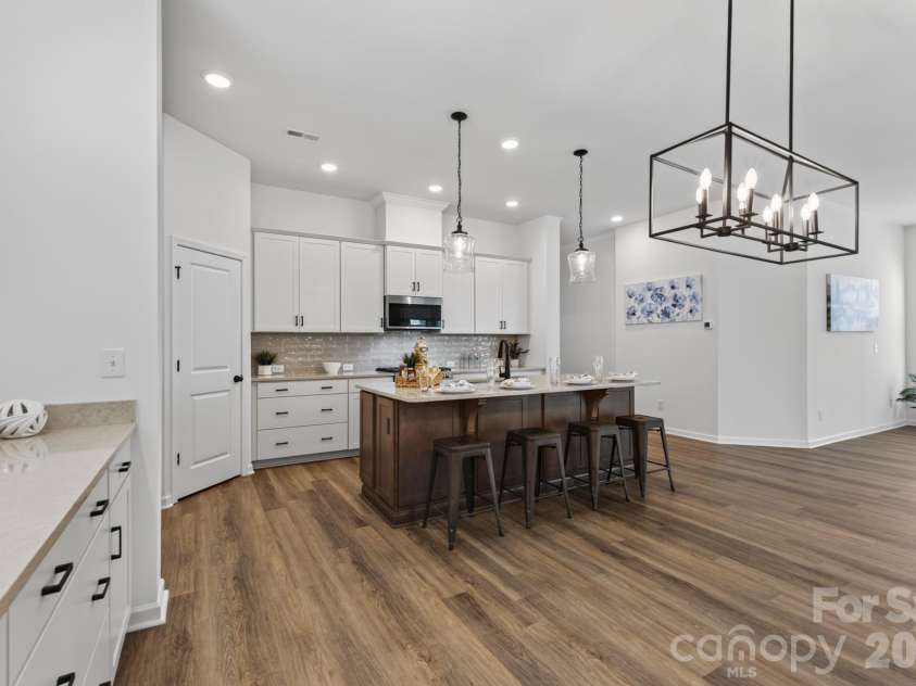 1338 Encore Lane, Waxhaw, NC 28173.  MLS# CAR4395212, YatesRealty ID 18890. Dining Area to Kitchen