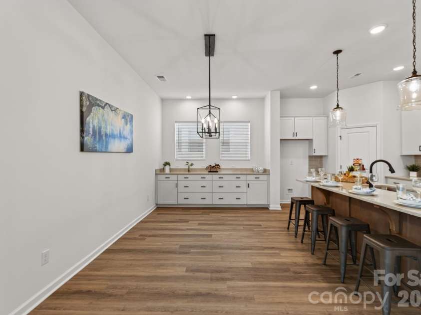 1338 Encore Lane, Waxhaw, NC 28173.  MLS# CAR4395212, YatesRealty ID 18890. Dining Area with serving counter and drawers