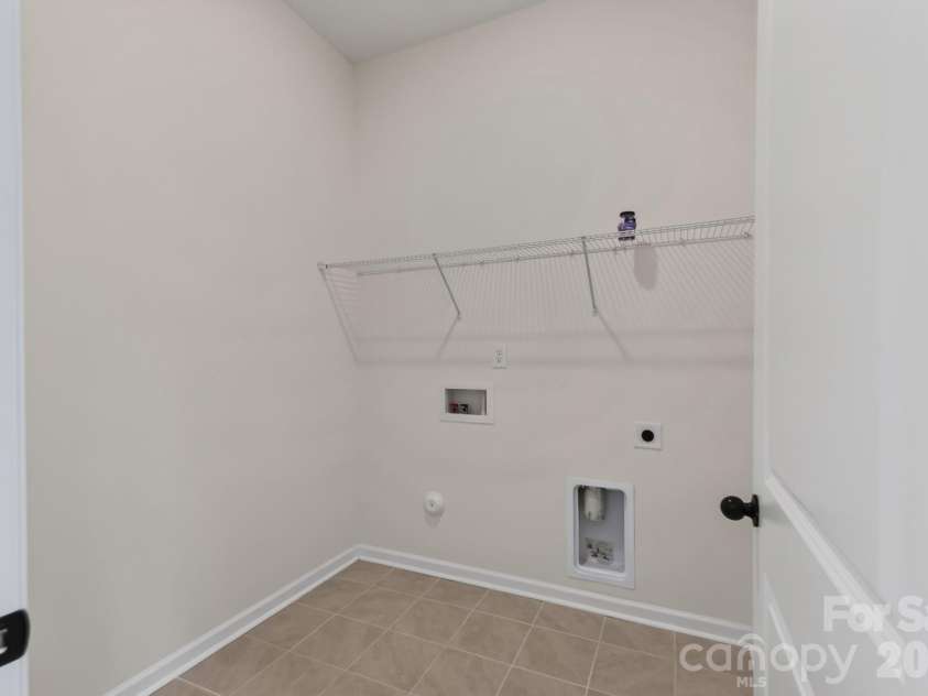 1338 Encore Lane, Waxhaw, NC 28173.  MLS# CAR4395212, YatesRealty ID 18890. Laundry Room