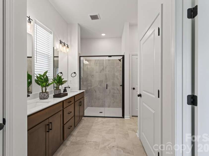 1338 Encore Lane, Waxhaw, NC 28173.  MLS# CAR4395212, YatesRealty ID 18890. Primary Bathroom