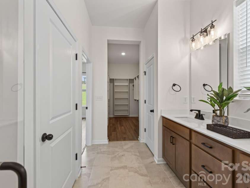 1338 Encore Lane, Waxhaw, NC 28173.  MLS# CAR4395212, YatesRealty ID 18890. Primary Bathroom to Primary Closet
