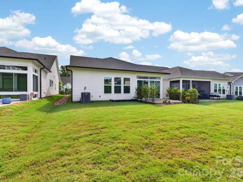 1338 Encore Lane, Waxhaw, NC 28173.  MLS# CAR4395212, YatesRealty ID 18890. Rear Exterior