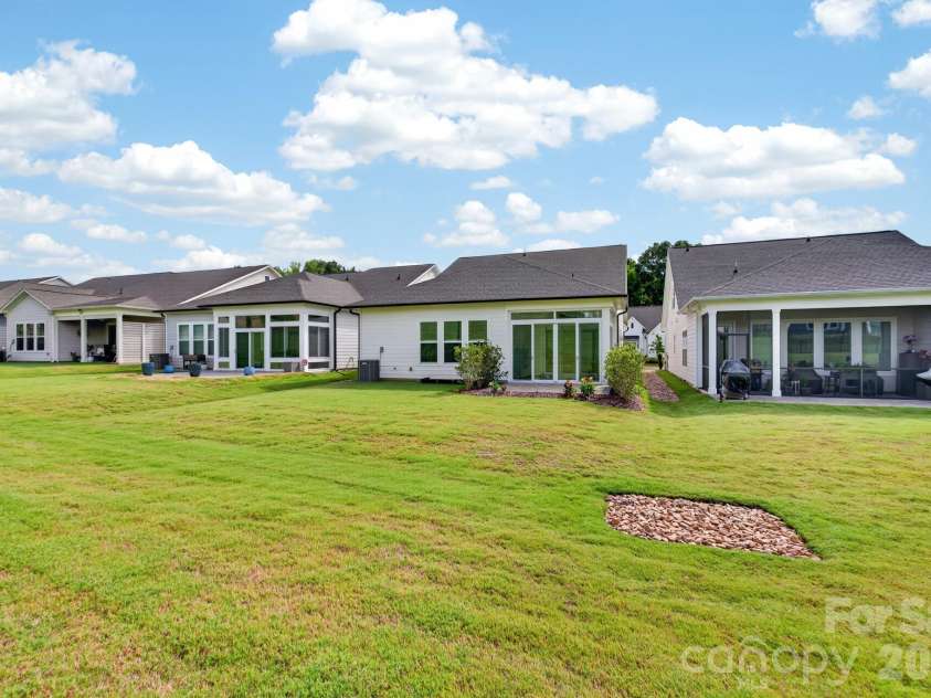 1338 Encore Lane, Waxhaw, NC 28173.  MLS# CAR4395212, YatesRealty ID 18890. Rear Exterior 