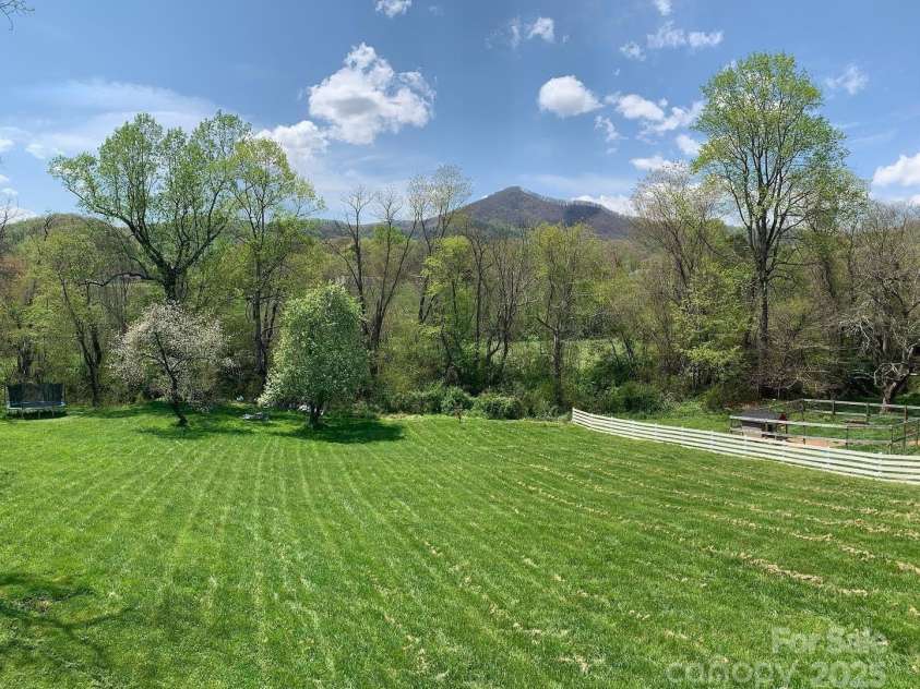 123 Dapple Road, Candler, NC 28715.  MLS# CAR4257282, YatesRealty ID 18892. 