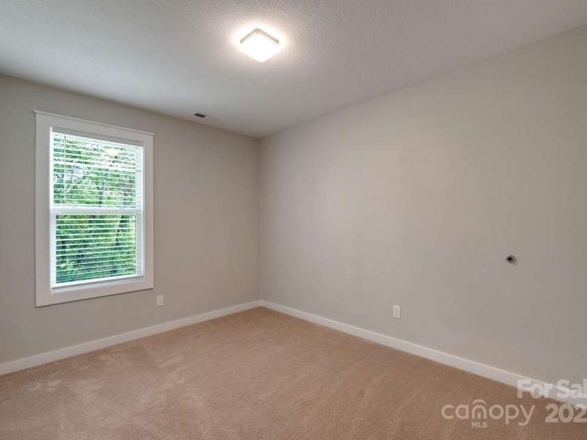 123 Dapple Road, Candler, NC 28715.  MLS# CAR4257282, YatesRealty ID 18892. Bedroom 2