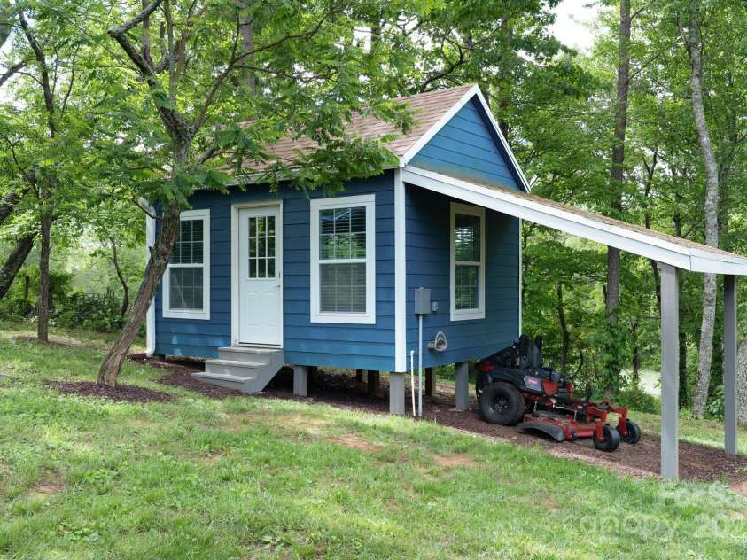 123 Dapple Road, Candler, NC 28715.  MLS# CAR4257282, YatesRealty ID 18892. BONUS: detached studio space!