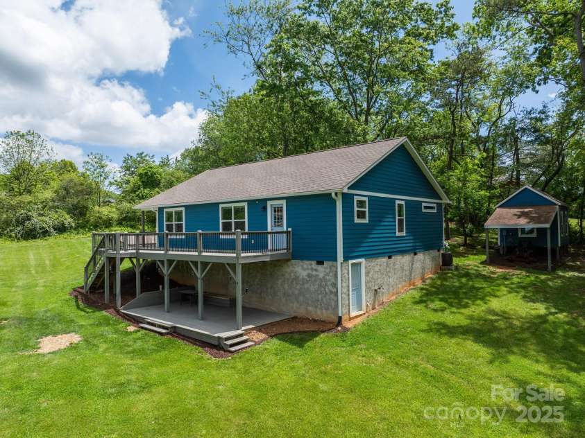 123 Dapple Road, Candler, NC 28715.  MLS# CAR4257282, YatesRealty ID 18892. Great wrap around porch to enjoy Mountain views