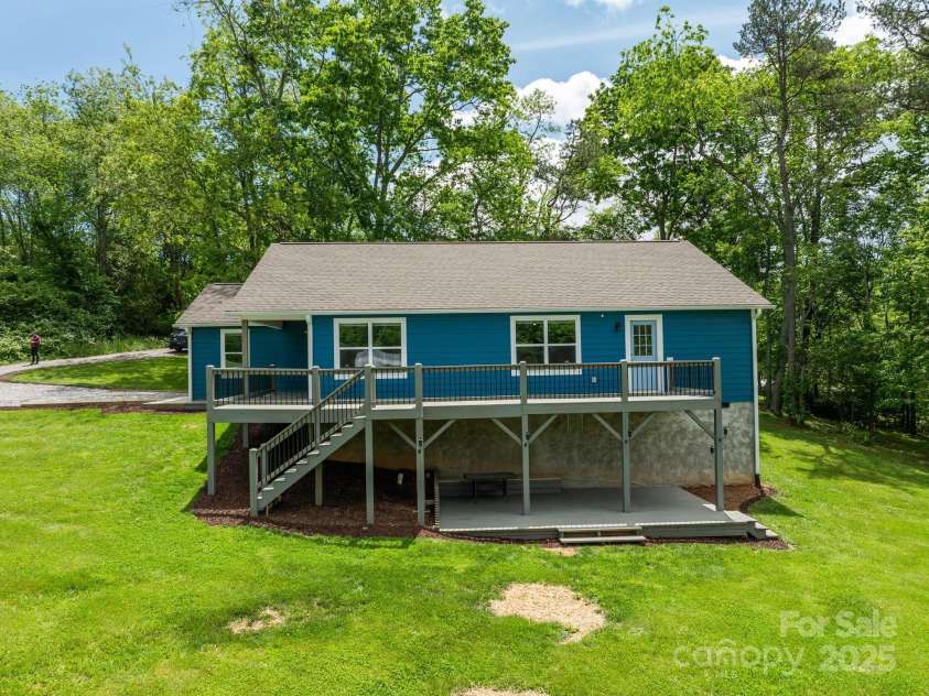 123 Dapple Road, Candler, NC 28715.  MLS# CAR4257282, YatesRealty ID 18892. Huge yard and 2 level deck