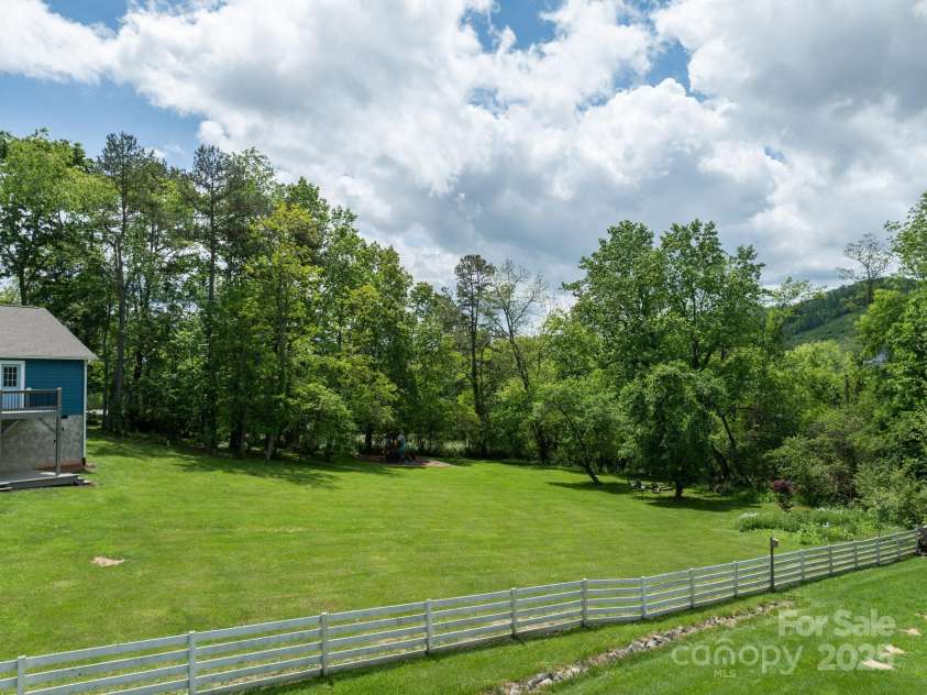 123 Dapple Road, Candler, NC 28715.  MLS# CAR4257282, YatesRealty ID 18892. Plenty of backyard space
