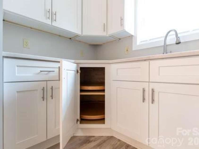 138 Pacific Drive, Statesville, NC 28677.  MLS# CAR4346044, YatesRealty ID 18893. Two Lazy Susan Cabinets