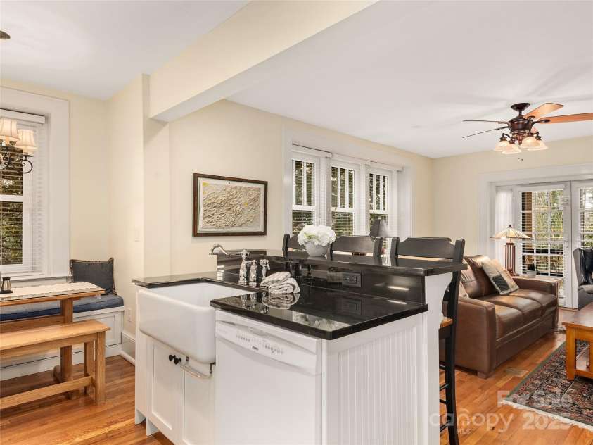 203 6th Avenue, Hendersonville, NC 28739.  MLS# CAR4288242, YatesRealty ID 18894. Built for entertaining, or just relaxing!