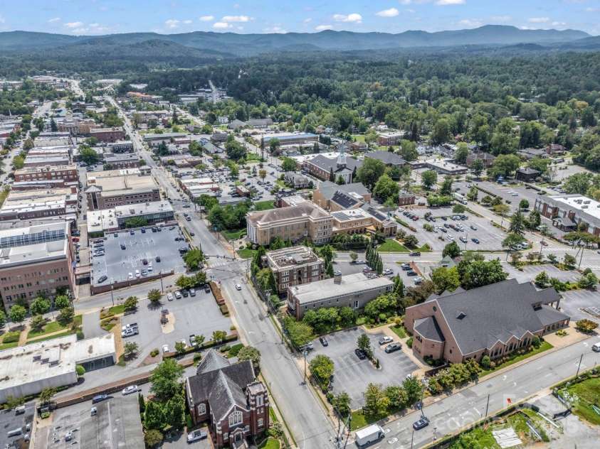 203 6th Avenue, Hendersonville, NC 28739.  MLS# CAR4288242, YatesRealty ID 18894. Sound proof barrier for all your privacy and quiet nights near downtown Hendersonville, 1 block to all you need!