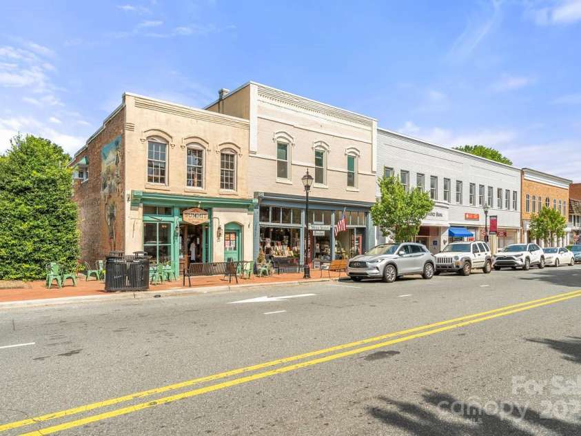 15133 Rocky Bluff Loop, Davidson, NC 28036.  MLS# CAR4246119, YatesRealty ID 18895. Downtown Davidson shops