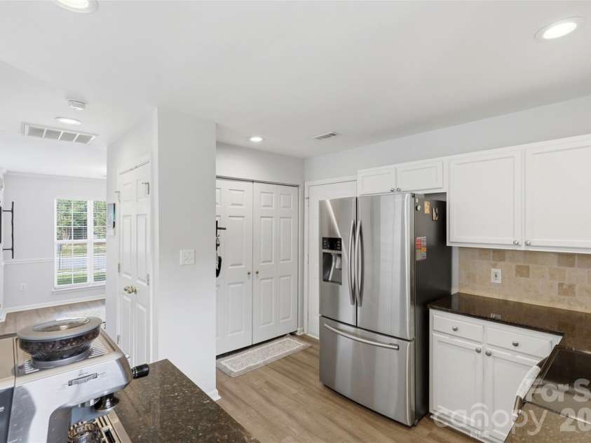 7130 Gallatin Lane, Charlotte, NC 28213.  MLS# CAR4369797, YatesRealty ID 18896. View into garage access and laundry