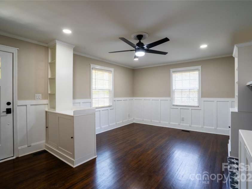 4429 Major Street, Charlotte, NC 28208.  MLS# CAR4243090, YatesRealty ID 18897. Family Room with judges oaneling and ample built in storage