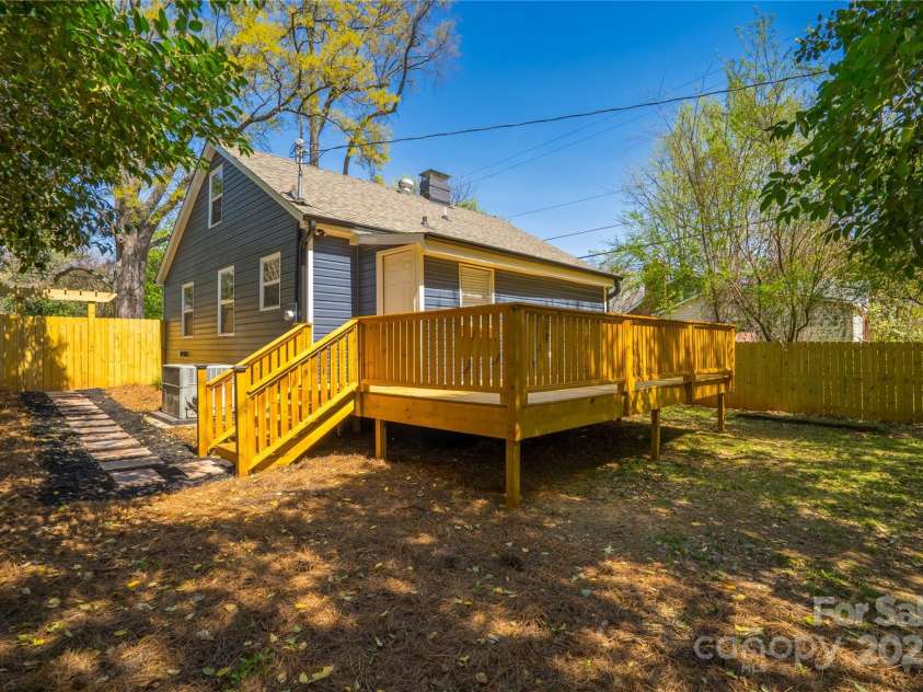4429 Major Street, Charlotte, NC 28208.  MLS# CAR4243090, YatesRealty ID 18897. Fully Fenced Yard and generous deck with stepping stones to gate