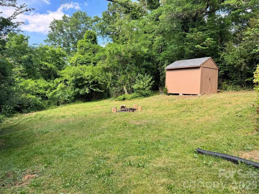 153 American Avenue, Concord, NC 28025.  MLS# CAR4373583, YatesRealty ID 18898. Backyard / Shed