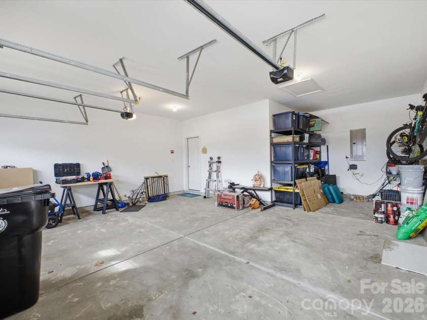 1049 River Haven Avenue, Concord, NC 28025.  MLS# CAR4345937, YatesRealty ID 1890. Garage w/extra storage space or golf cart niche