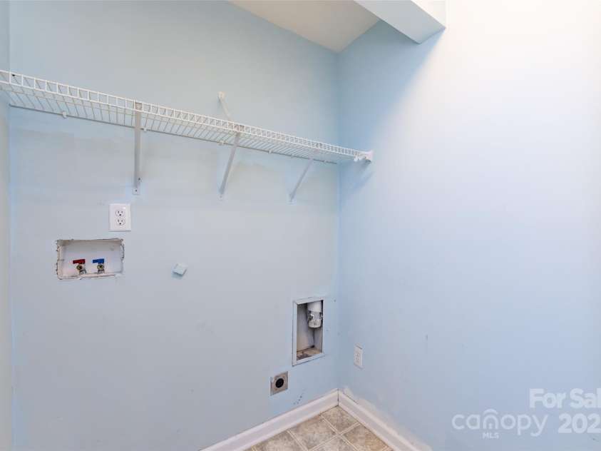 15623 Sir Charles Place, Charlotte, NC 28277.  MLS# CAR4257942, YatesRealty ID 18900. 1st Floor Laundry Room