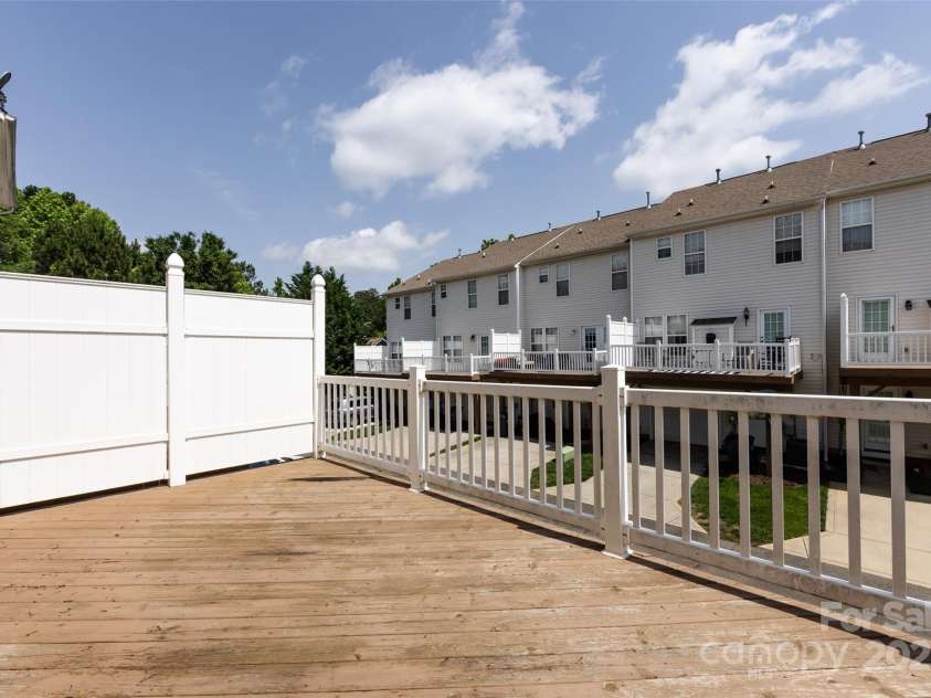 15623 Sir Charles Place, Charlotte, NC 28277.  MLS# CAR4257942, YatesRealty ID 18900. Deck off Livingroom