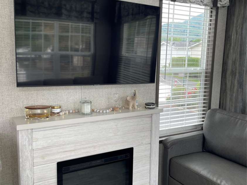 43 Vacation Pointe, Waynesville, NC 28785.  MLS# CAR4267523, YatesRealty ID 18903. Gas logs for cozy living when it's cool.