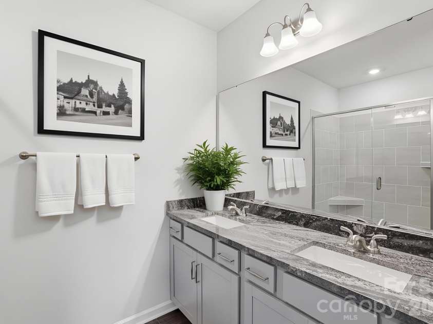5835 Tuckaseegee Road, Charlotte, NC 28208.  MLS# CAR4401603, YatesRealty ID 18910. Virtually staged  primary bathroom