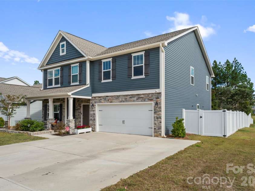 2014 Mcdonald Drive, Stanfield, NC 28163.  MLS# CAR4371123, YatesRealty ID 18913. 6 Ft Tall Privacy fencing surrounds back yard