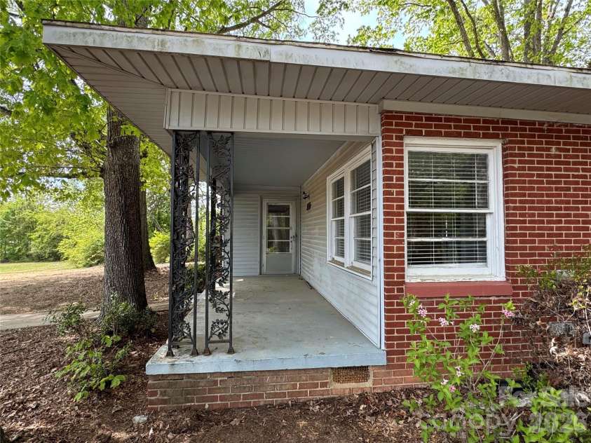 509 Main Street, Locust, NC 28097.  MLS# CAR4365906, YatesRealty ID 18915. Front Porch