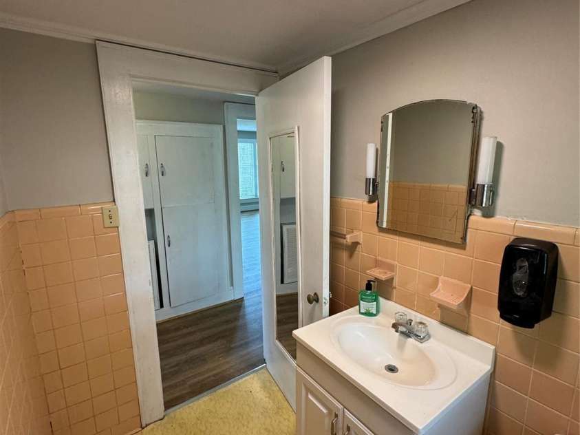 509 Main Street, Locust, NC 28097.  MLS# CAR4365906, YatesRealty ID 18915. Hall Bathroom