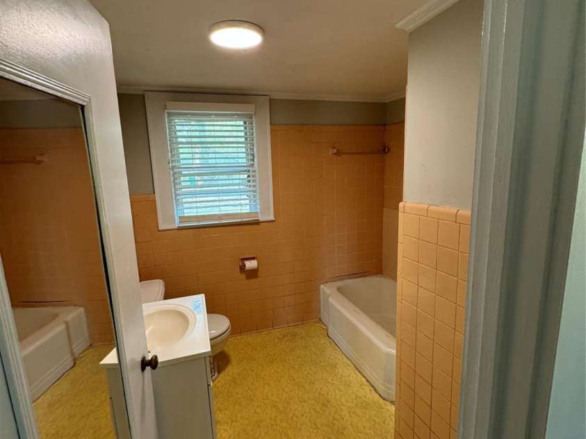 509 Main Street, Locust, NC 28097.  MLS# CAR4365906, YatesRealty ID 18915. Hall Bathroom