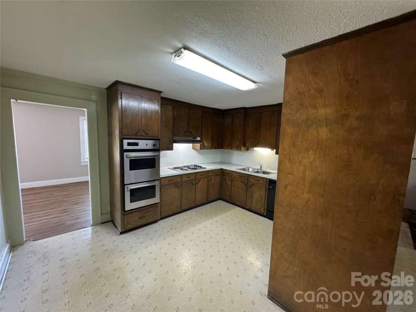 509 Main Street, Locust, NC 28097.  MLS# CAR4365906, YatesRealty ID 18915. Kitchen