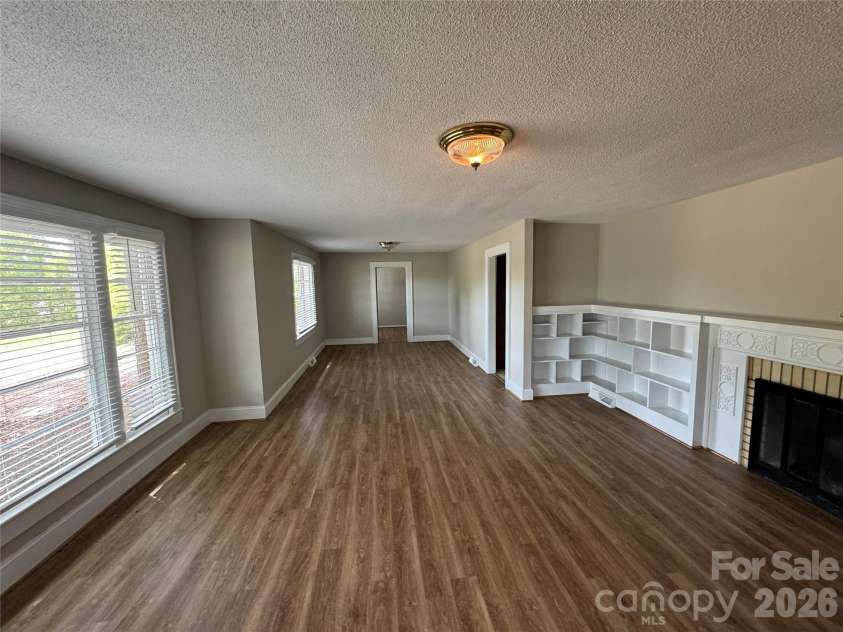 509 Main Street, Locust, NC 28097.  MLS# CAR4365906, YatesRealty ID 18915. Living and Dining