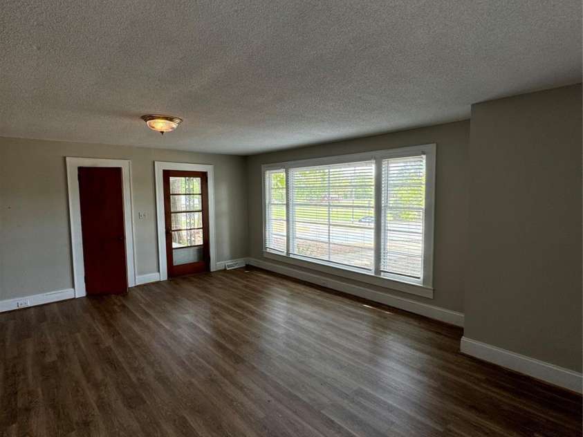 509 Main Street, Locust, NC 28097.  MLS# CAR4365906, YatesRealty ID 18915. Living Room