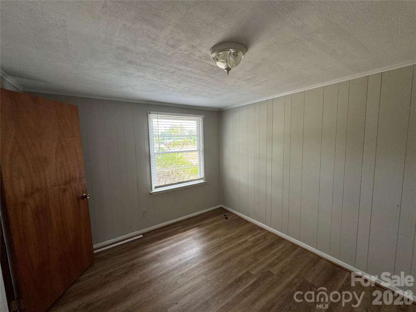 509 Main Street, Locust, NC 28097.  MLS# CAR4365906, YatesRealty ID 18915. Primary Bedroom