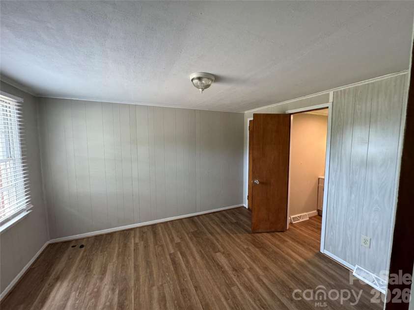 509 Main Street, Locust, NC 28097.  MLS# CAR4365906, YatesRealty ID 18915. Primary Bedroom