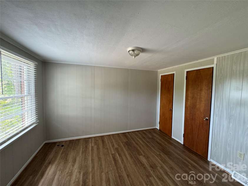 509 Main Street, Locust, NC 28097.  MLS# CAR4365906, YatesRealty ID 18915. Primary Bedroom