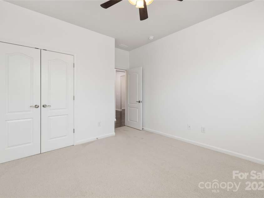 14210 Asbury Park Road, Huntersville, NC 28078.  MLS# CAR4252719, YatesRealty ID 18916. First floor bedroom