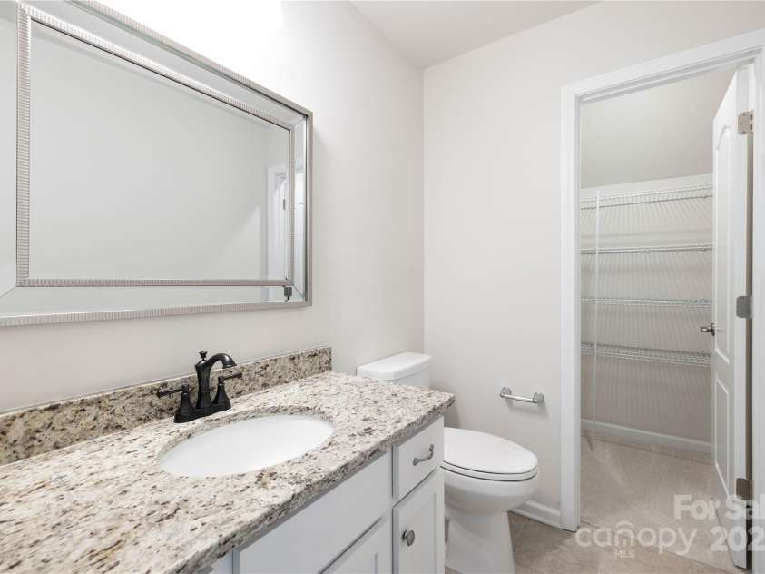 14210 Asbury Park Road, Huntersville, NC 28078.  MLS# CAR4252719, YatesRealty ID 18916. Full upstairs bathroom