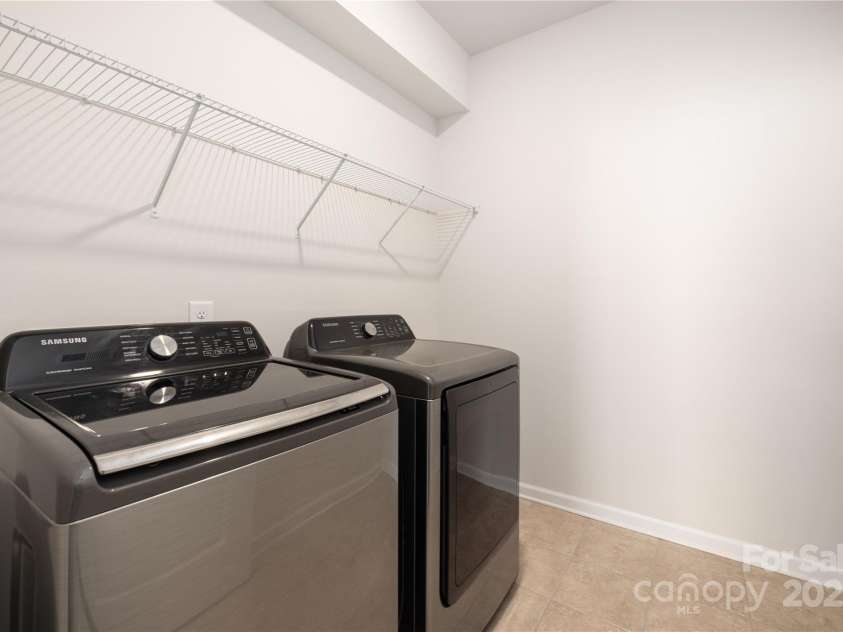 14210 Asbury Park Road, Huntersville, NC 28078.  MLS# CAR4252719, YatesRealty ID 18916. Laundry room near garage on main floor