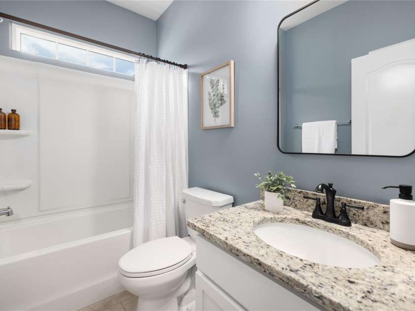 14210 Asbury Park Road, Huntersville, NC 28078.  MLS# CAR4252719, YatesRealty ID 18916. Main floor bathroom