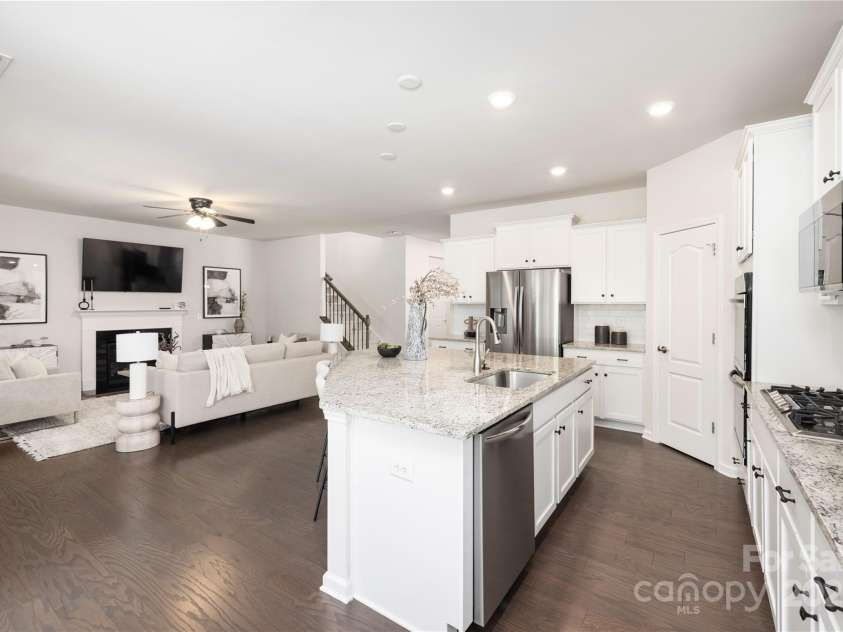 14210 Asbury Park Road, Huntersville, NC 28078.  MLS# CAR4252719, YatesRealty ID 18916. Open kitchen and living area