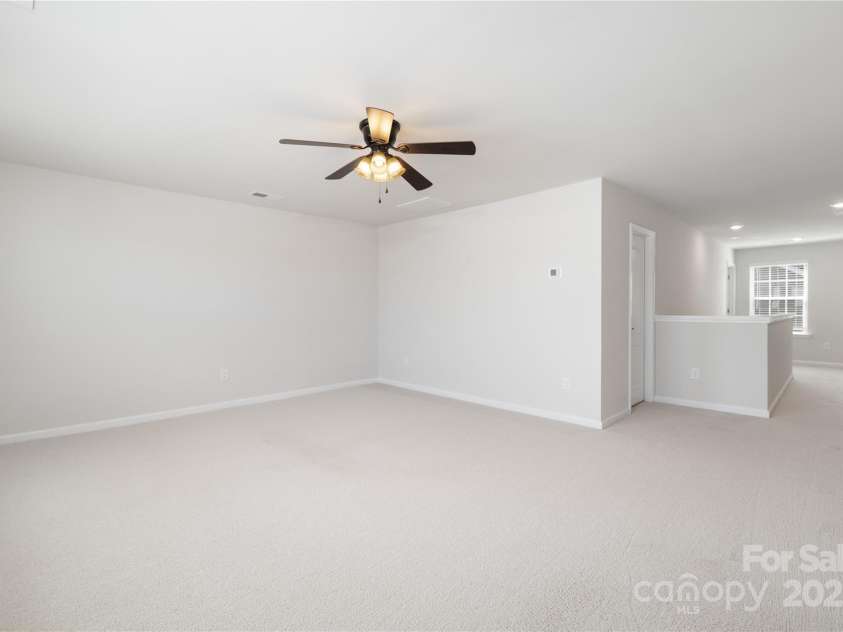 14210 Asbury Park Road, Huntersville, NC 28078.  MLS# CAR4252719, YatesRealty ID 18916. Spacious bonus room upstairs!