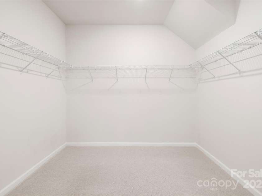 14210 Asbury Park Road, Huntersville, NC 28078.  MLS# CAR4252719, YatesRealty ID 18916. Walk in closet for primary bedroom