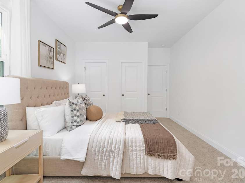 7717 Nautical View Drive, Denver, NC 28037.  MLS# CAR4304896, YatesRealty ID 18916. Main Level Guest Bedroom